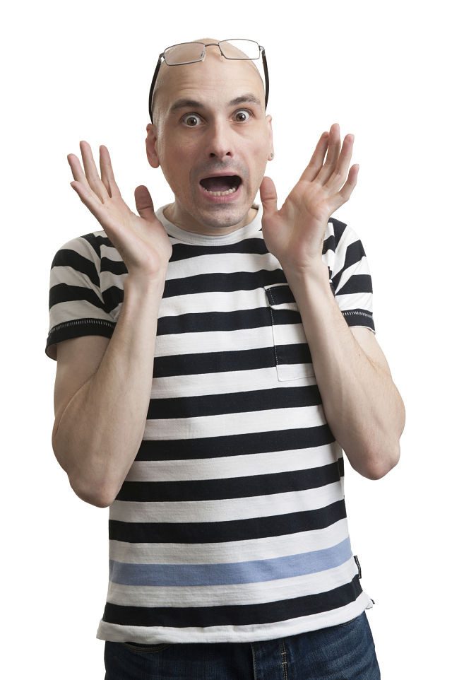 bald man with shocked facial expression