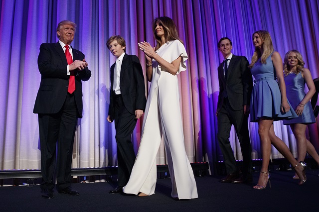 Republican presidential candidate Donald Trump, left, arrives to speak to an election night rally, Wednesday, Nov. 9, 2016, in New York. From left, Trump, his son Barron, wife Melania, Jared Kushner, Ivanka Trump, and Tiffany Trump.